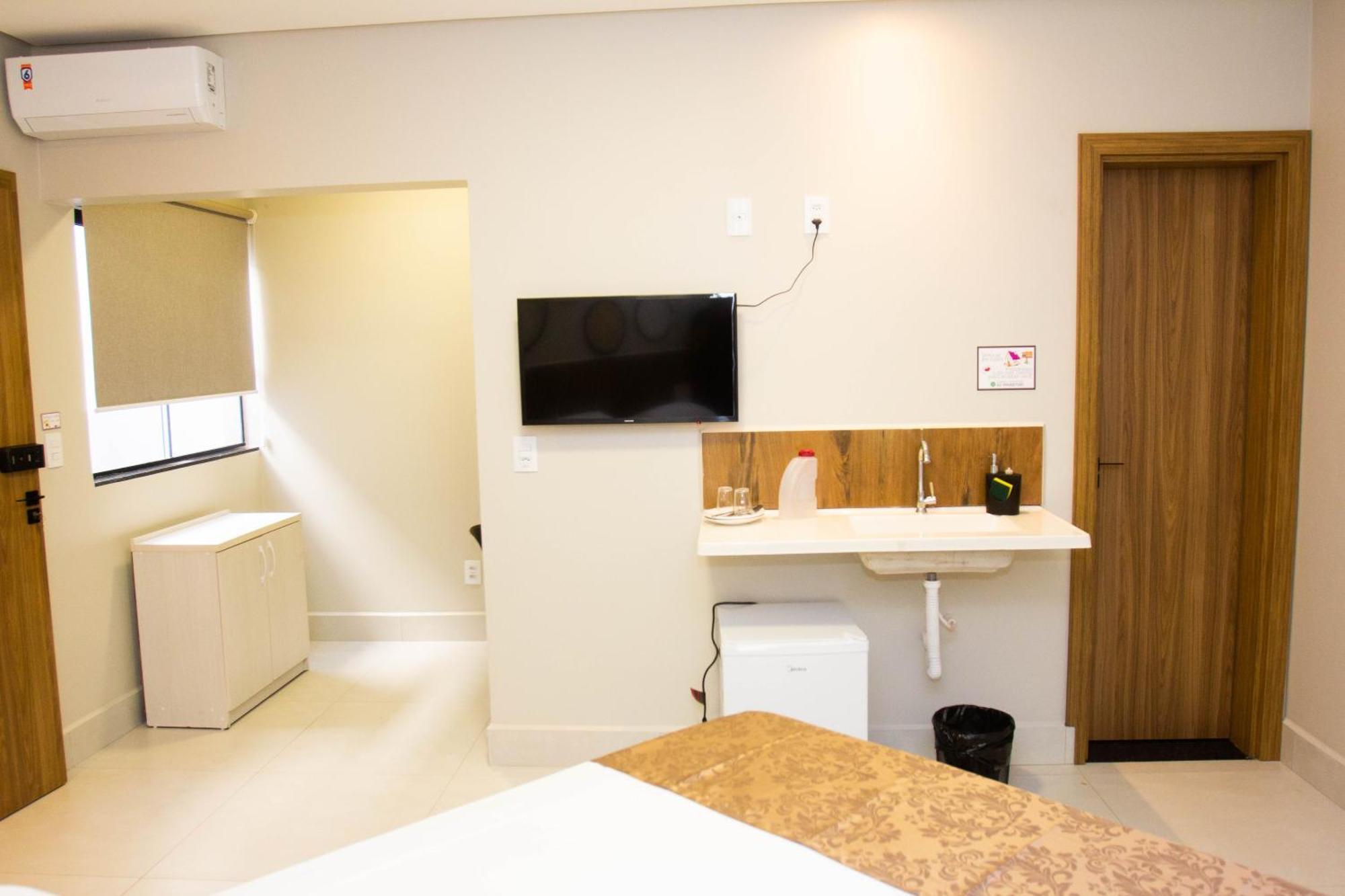 Fiori Suites Goiania Phòng bức ảnh